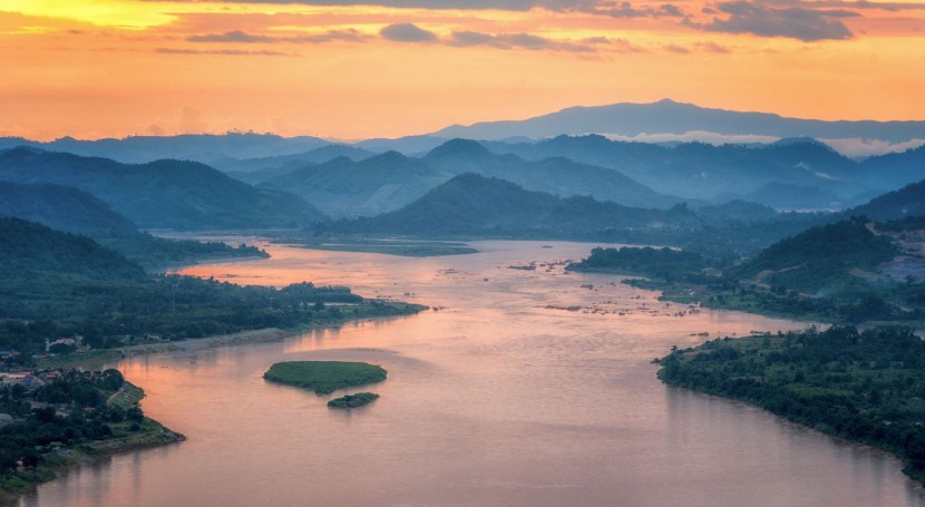 mekong river with mountains and sunset
