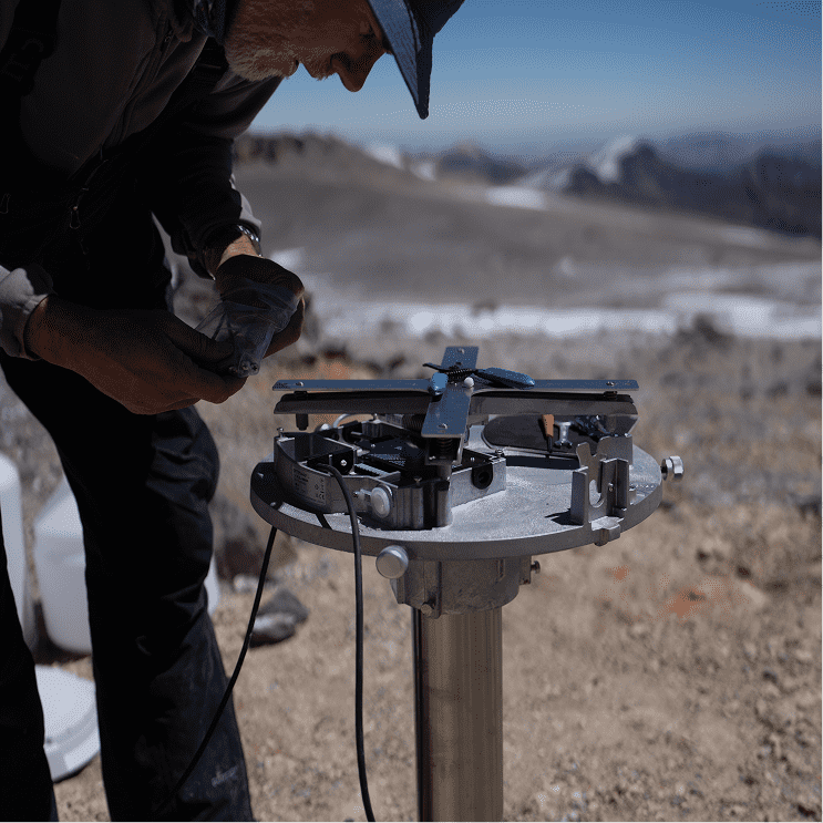 Meteorologist installing an ott pluvio