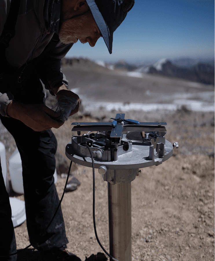 Meteorologist installing an ott pluvio